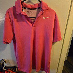 Nike Dri-FIT short-sleeve golf polo shirt in a bright or vivid pink co  Mens M